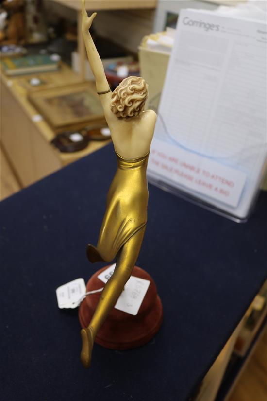 An Art Deco bronze and carved ivory figure Butterfly dancer, by Prof Otto Poertzel width 26cm height 34cm, replacement base